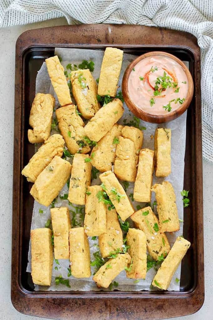 Chickpea flour fries on a baking sheet.
