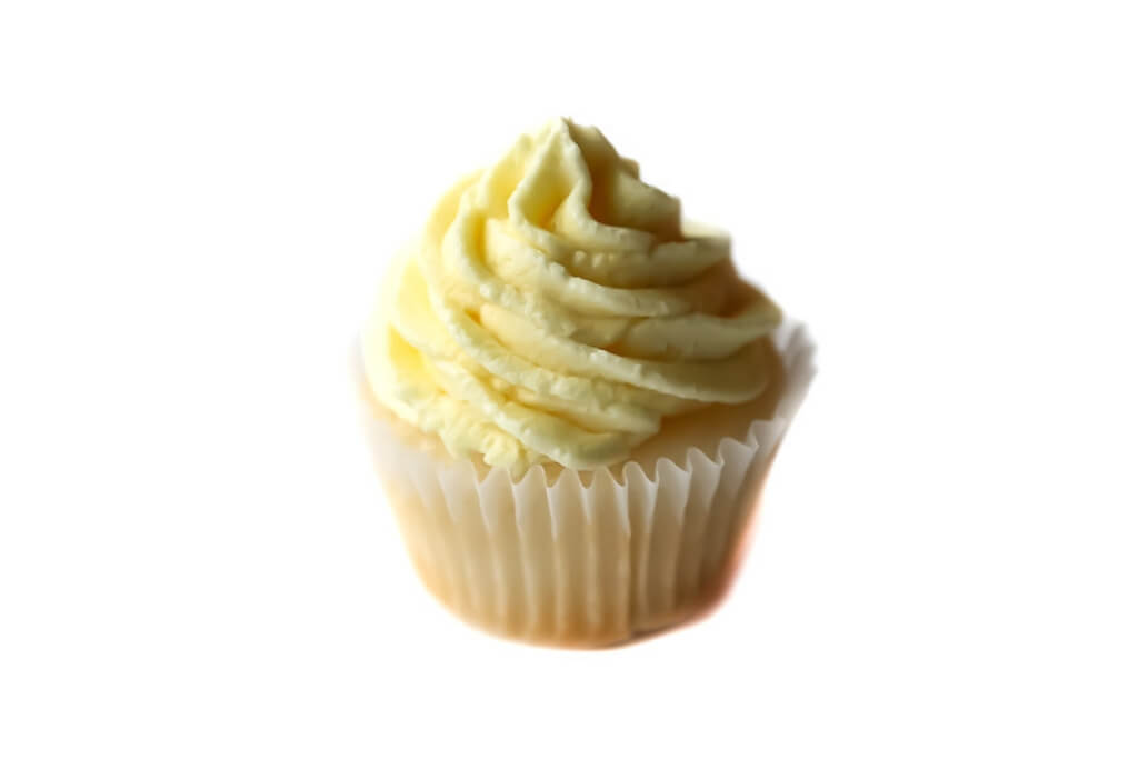 An easy vegan lemon cupcake topped with vegan lemon buttercream.