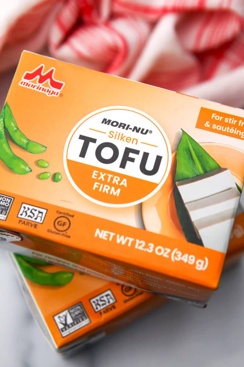 Two boxes of extra firm sliken tofu stacked on top of eachother.