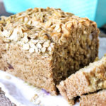 A loaf of easy vegan beer bread that has been sliced.