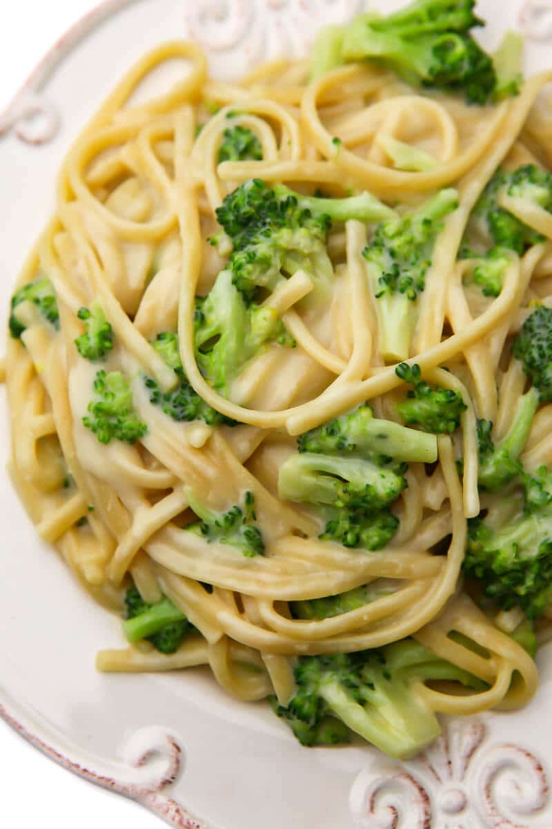 A top view of a plate of vegan broccoli alfredo.