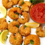 A close up of battered and deep fried vegan shrimp.