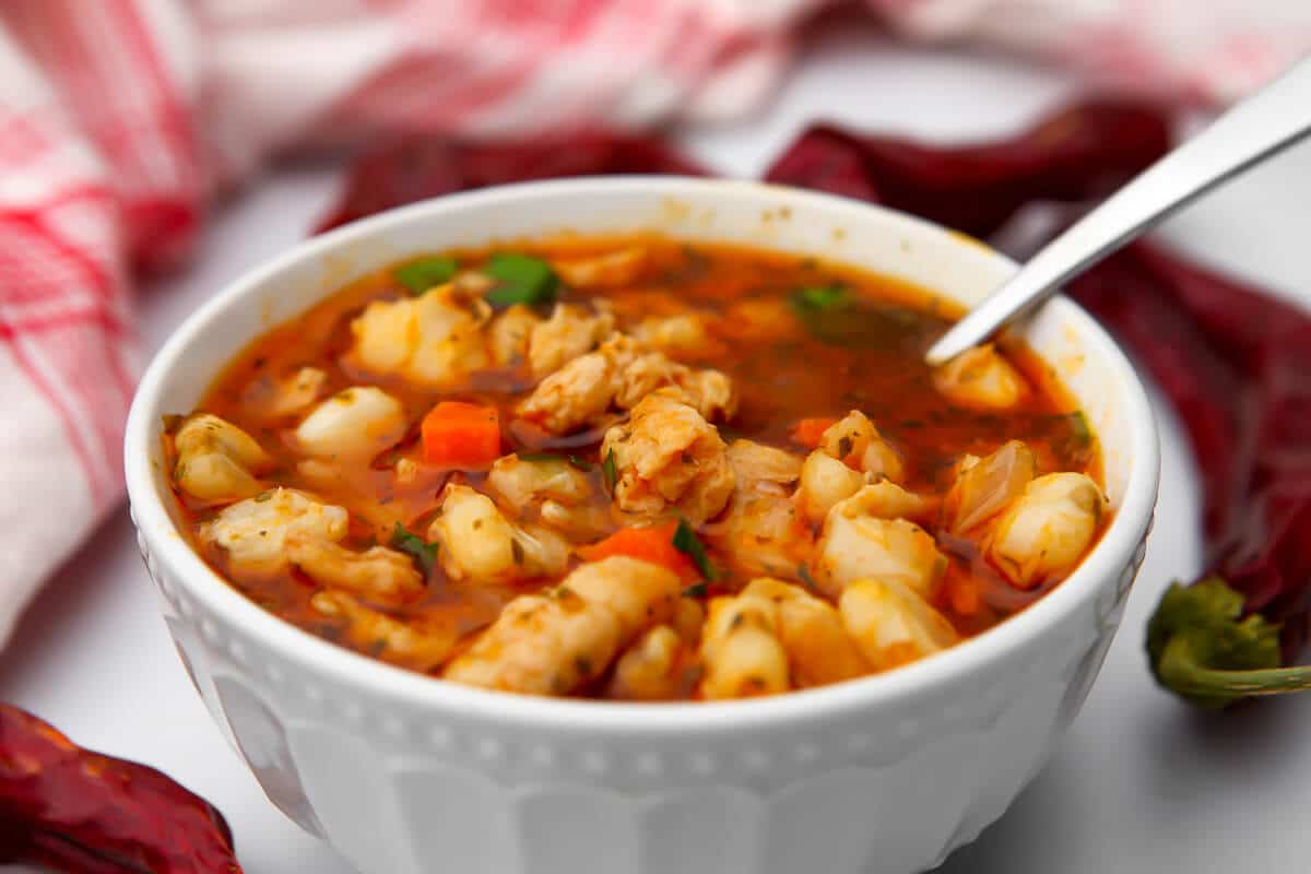 Vegan posole soup with Butler Soy Curls for the meat replacement with red chiles on the side.