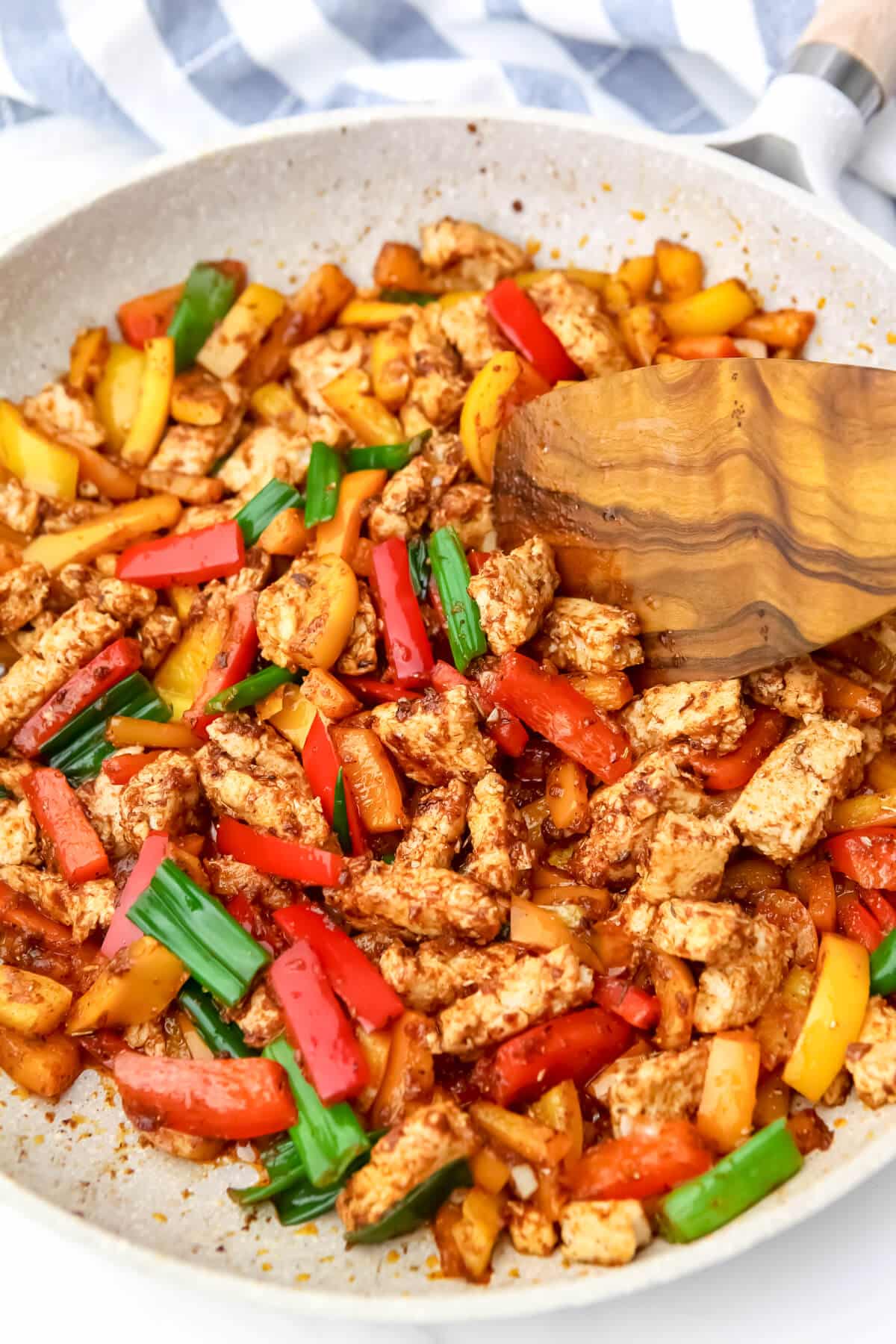 Vegan jerk chicken and peppers before the cream and pasta is added.