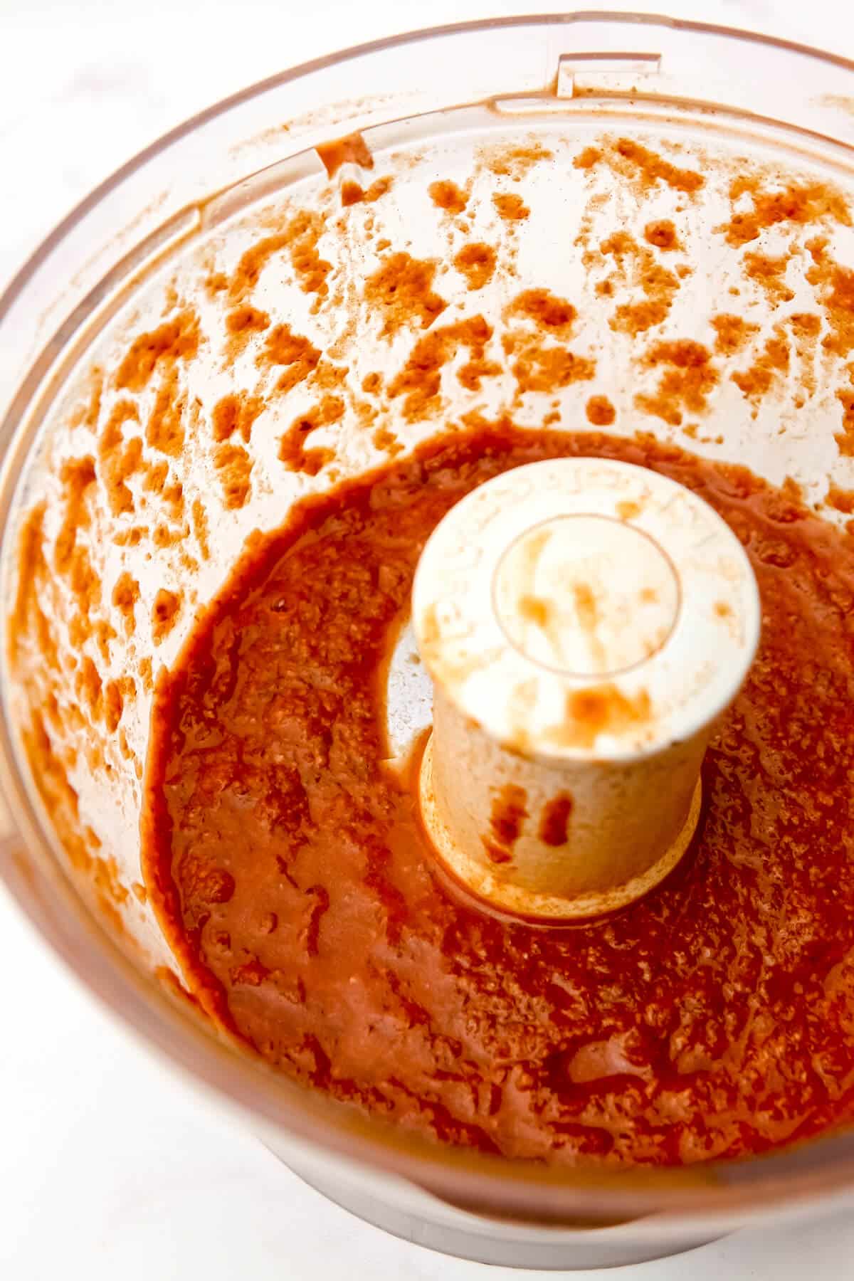 Pureed onions, mushrooms, and broth in a food processor.