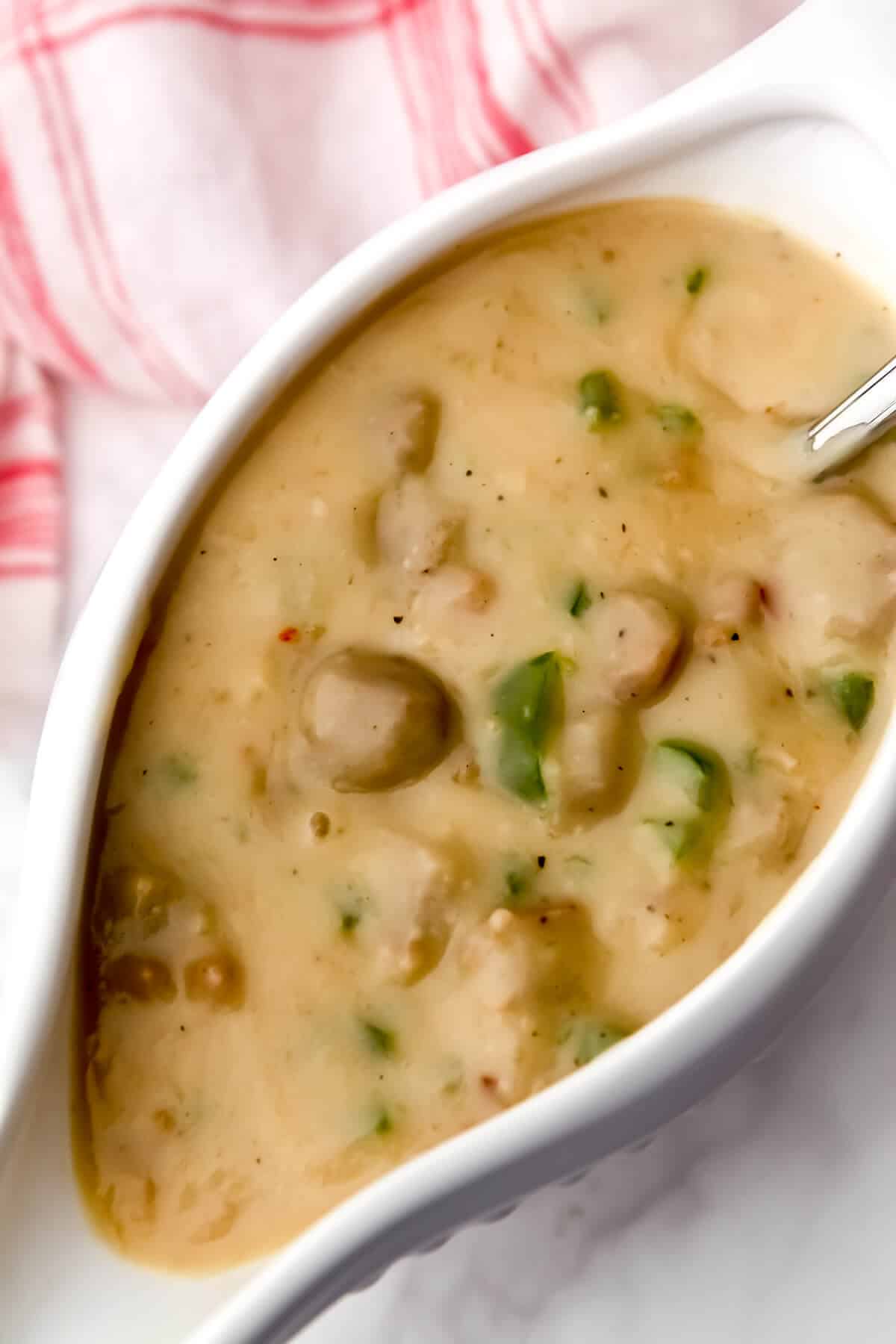 Vegan sausage gravy in a gravy boat.