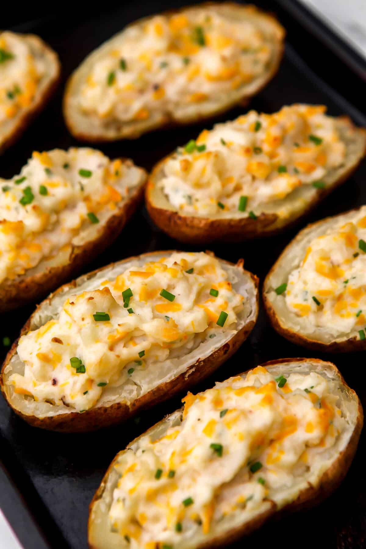 Vegan twice baked potatoes after they have been baked a second time.